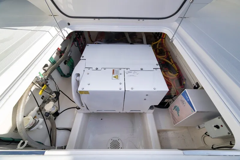 Slide: The Image of 2020 Bahama 41 engine compartment with electrical components and wiring. - 35