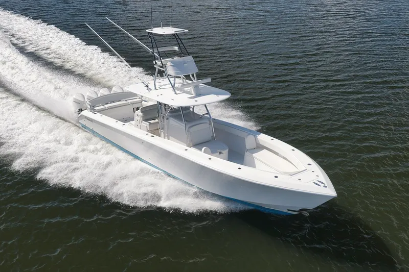 The Image of 2020 Bahama 41 boat cruising swiftly on open water. - 0