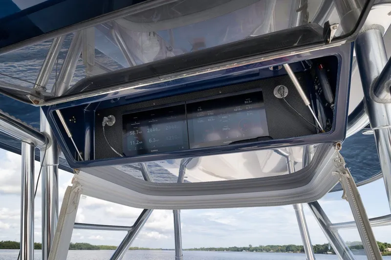 Slide: The Image of Control panel of a 2020 Bahama 41 boat with digital display and sleek design. - 64