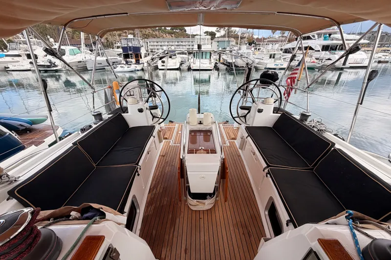 Slide: The Image of Cockpit view of 2015 Jeanneau Sun Odyssey 469 yacht docked at marina. - 22