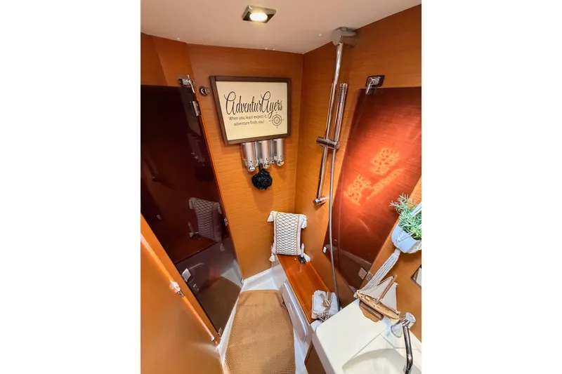 Slide: The Image of Bathroom interior of 2015 Jeanneau Sun Odyssey 469 yacht with shower and decor. - 64