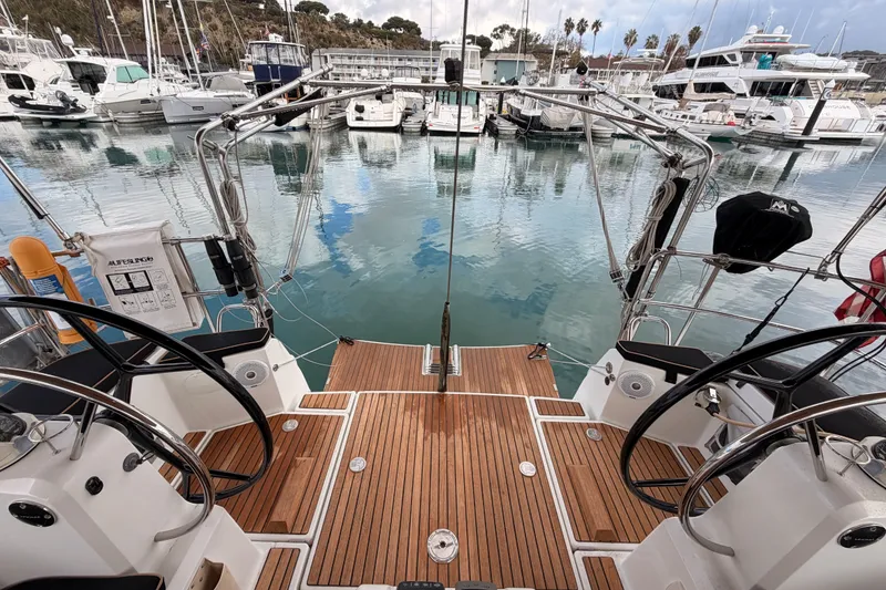 Slide: The Image of Cockpit view of 2015 Jeanneau Sun Odyssey 469 yacht docked at marina. - 23