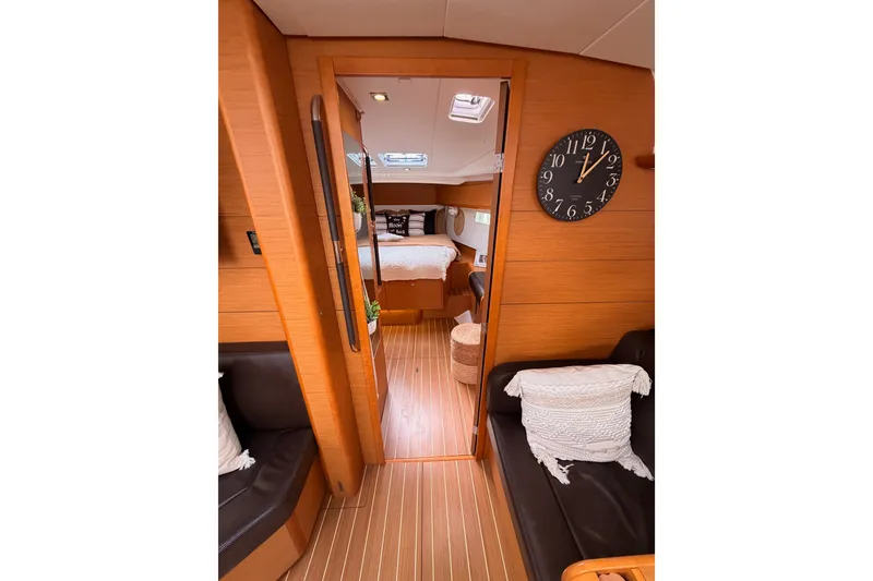 Slide: The Image of Interior of 2015 Jeanneau Sun Odyssey 469 yacht with cozy cabin and stylish decor. - 58