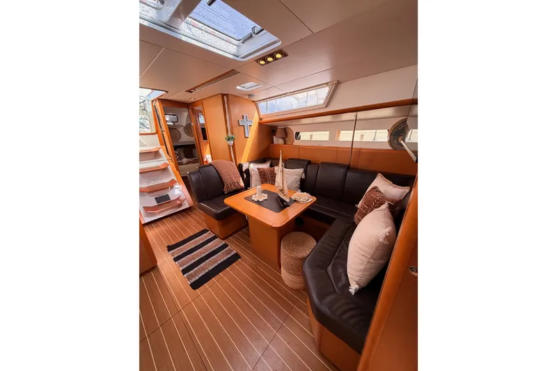 Slide: The Image of Luxurious interior of 2015 Jeanneau Sun Odyssey 469 yacht with elegant seating and decor. - 69