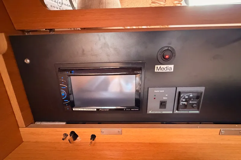 Slide: The Image of Control panel of a 2015 Jeanneau Sun Odyssey 469 yacht with media system. - 55