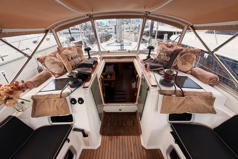Slide: The Image of Cozy cockpit of 2015 Jeanneau Sun Odyssey 469 sailboat with cushions and decor. - 37