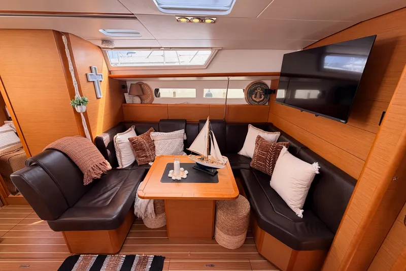 Slide: The Image of Luxurious interior of 2015 Jeanneau Sun Odyssey 469 yacht with cozy seating and decor. - 53