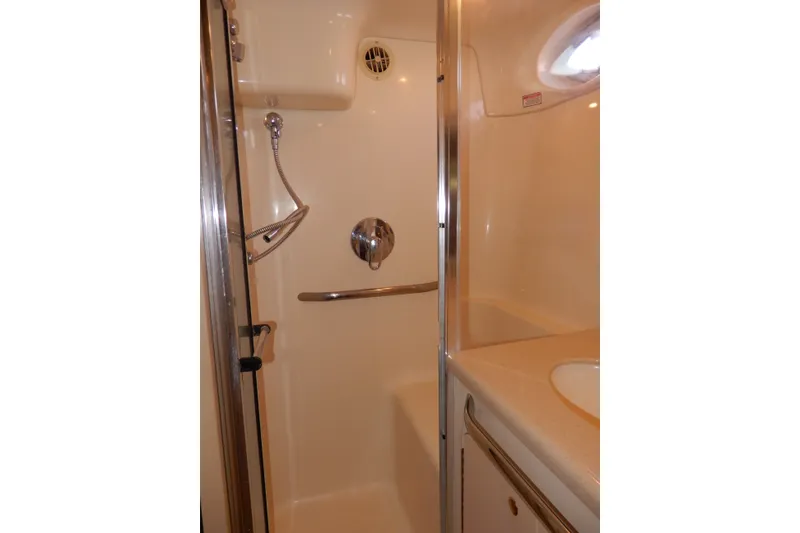 Slide: The Image of Shower area in 2000 Sea Ray 380 Aft Cabin yacht, featuring sleek design and fixtures. - 76