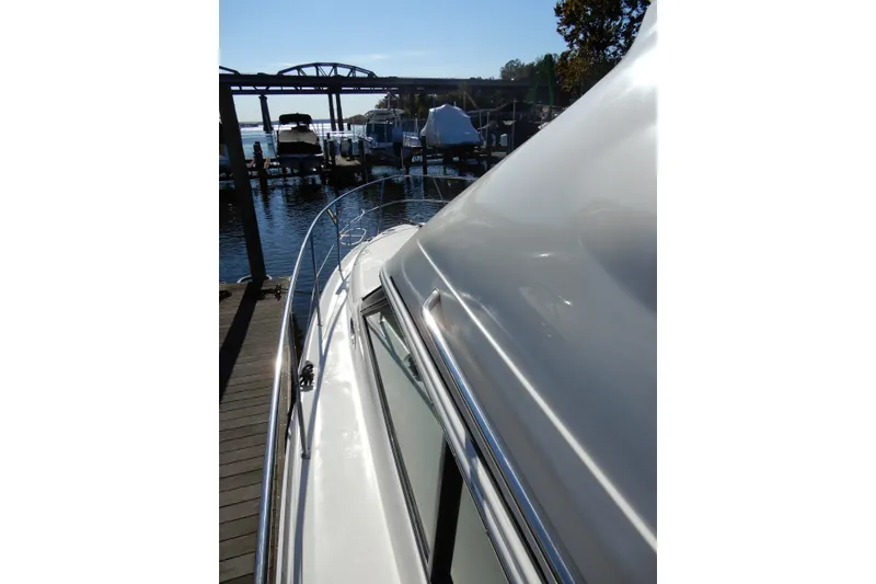 Slide: The Image of 2000 Sea Ray 380 Aft Cabin yacht docked at marina, sunny day. - 38