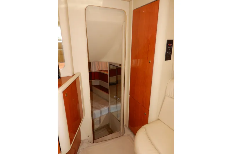 Slide: The Image of Interior of 2000 Sea Ray 380 Aft Cabin yacht, featuring a cozy cabin entrance. - 65