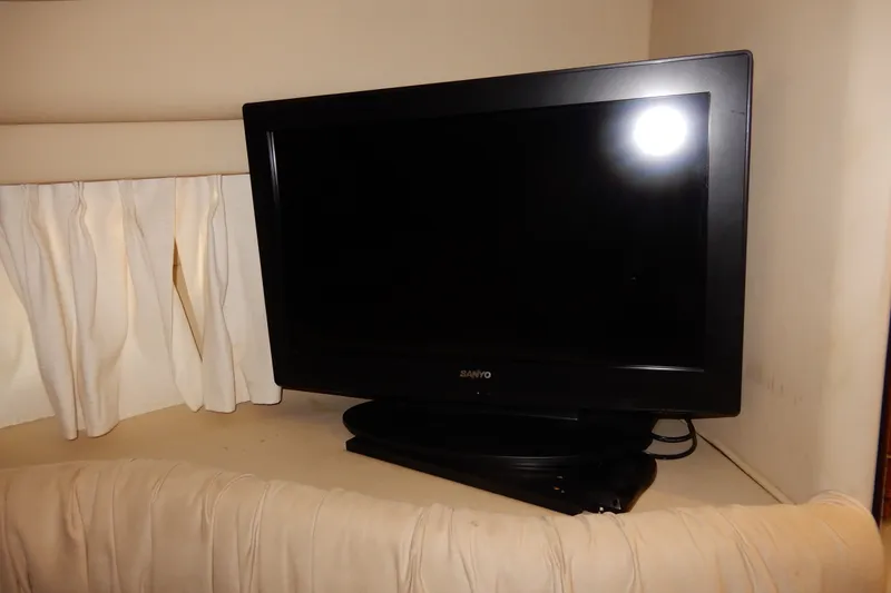 Slide: The Image of Flat-screen TV in 2000 Sea Ray 380 Aft Cabin yacht interior. - 64