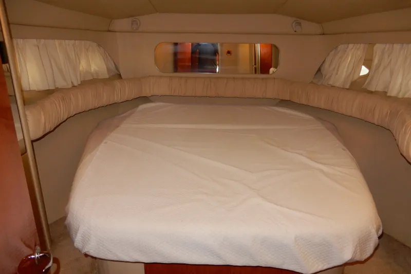 Slide: The Image of Interior cabin of 2000 Sea Ray 380 Aft Cabin yacht with bed and curtains. - 60