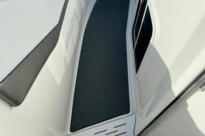 Slide: The Image of 2022 Formula 400 Super Sport Crossover deck with sleek design and textured flooring. - 40