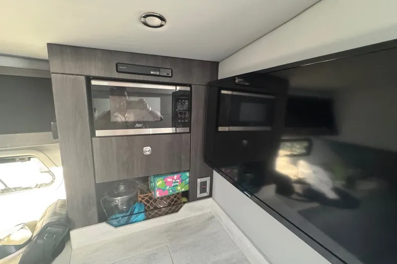 Slide: The Image of Interior of 2022 Formula 400 Super Sport Crossover with microwave and TV. - 37