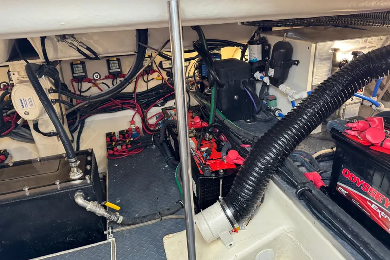 Slide: The Image of Engine compartment of a 2022 Formula 400 Super Sport Crossover with wiring and components. - 45