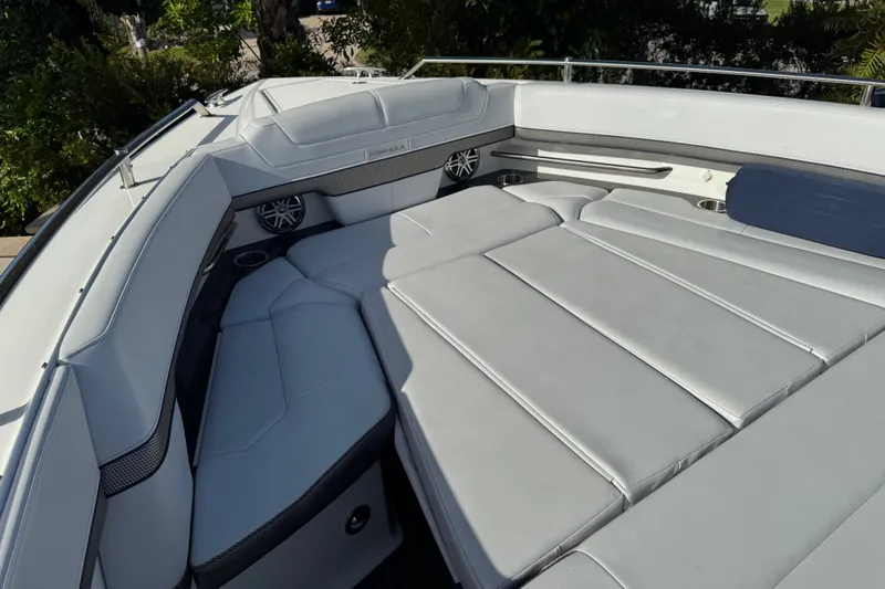 Slide: The Image of 2022 Formula 400 Super Sport Crossover boat interior with luxurious seating and sleek design. - 42