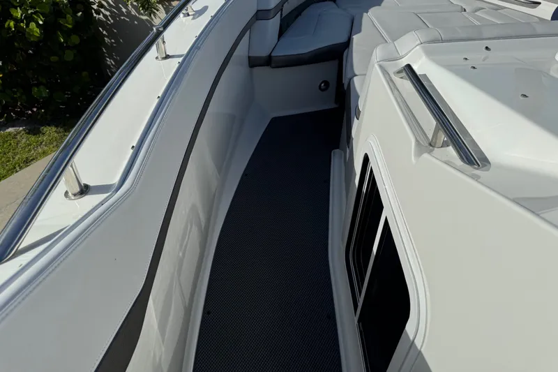 Slide: The Image of 2022 Formula 400 Super Sport Crossover boat deck with sleek seating and stainless steel railings. - 39