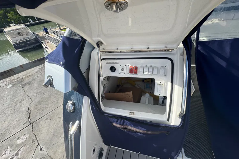 Slide: The Image of 2022 Formula 400 Super Sport Crossover boat electrical panel at dockside. - 19