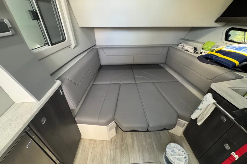 Slide: The Image of Interior of 2022 Formula 400 Super Sport Crossover with gray seating and modern design. - 33