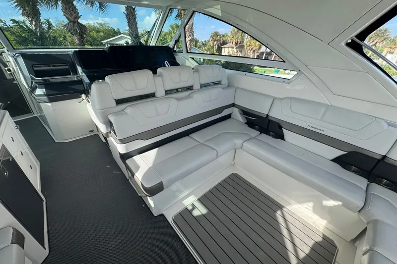 Slide: The Image of Luxurious interior of 2022 Formula 400 Super Sport Crossover yacht with plush seating. - 25