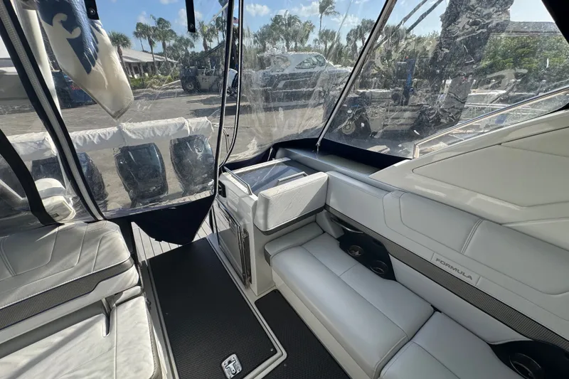 Slide: The Image of Interior of a 2022 Formula 400 Super Sport Crossover boat with luxurious seating. - 20
