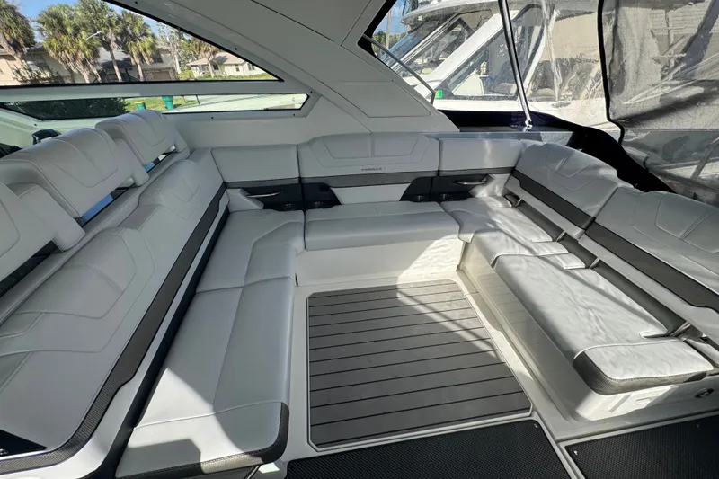 Slide: The Image of Luxurious interior of 2022 Formula 400 Super Sport Crossover with spacious seating and sleek design. - 24
