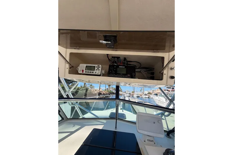 Slide: The Image of Interior view of a 2001 Austin Parker 2510DV boat with navigation equipment. - 10