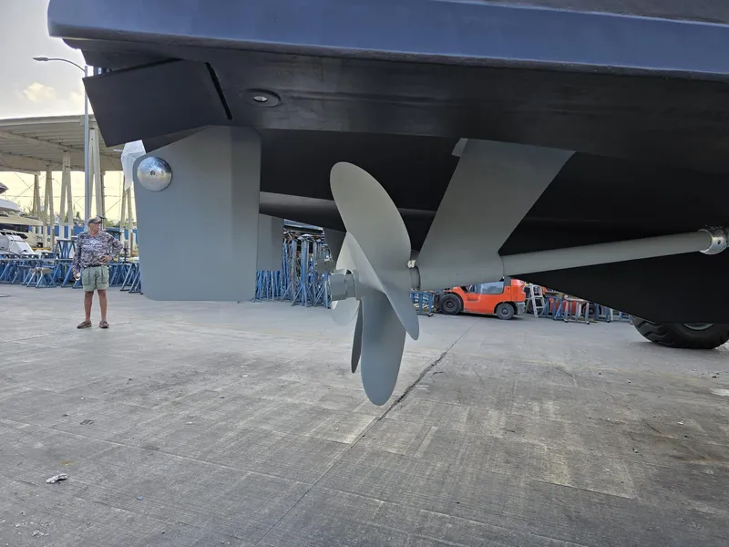 Slide: The Image of Propeller and rudder of 1994 Hatteras 82 Convertible yacht on dry dock. - 47