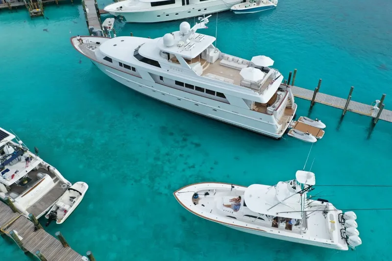 Slide: The Image of Aerial view of 1994 Delta Marine 110 Raised Pilothouse yacht docked in turquoise waters. - 21