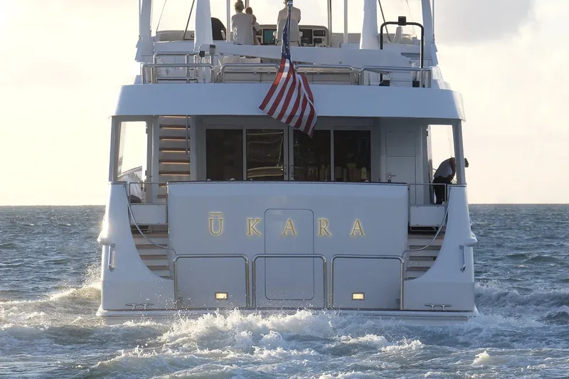Slide: The Image of Luxury yacht "ŪKARA" cruising, Delta Marine 110 Raised Pilothouse, 1994 model, ocean backdrop. - 6