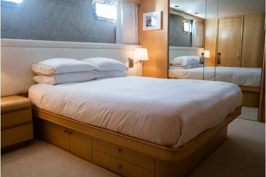 Slide: The Image of Luxurious bedroom interior on 1994 Delta Marine 110 Raised Pilothouse yacht. - 32