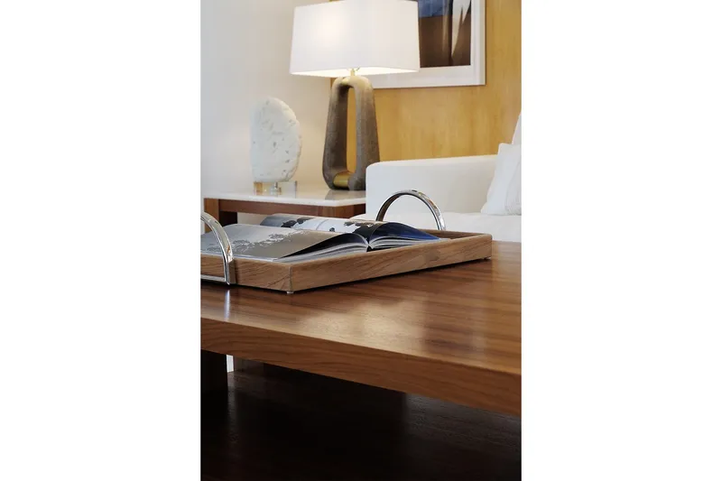 Slide: The Image of Luxurious interior of Delta Marine 110 Raised Pilothouse yacht, featuring elegant wooden table and decor. - 36