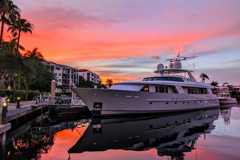 Slide: The Image of Delta Marine 110 Raised Pilothouse yacht docked at sunset, 1994 model. - 10