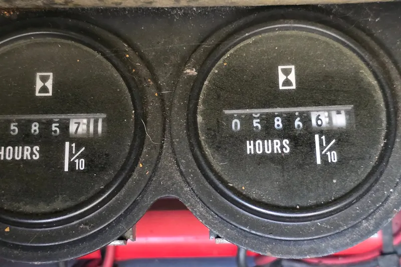 Slide: The Image of Hour meters on a 1994 Sunseeker Mustique 42, displaying 5857 and 5866 hours. - 32