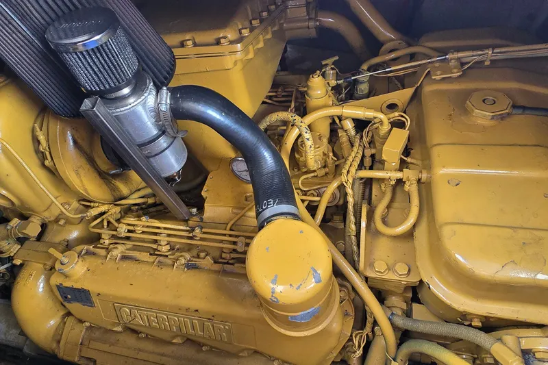 Slide: The Image of Engine compartment of a 1994 Sunseeker Mustique 42 with Caterpillar components. - 34