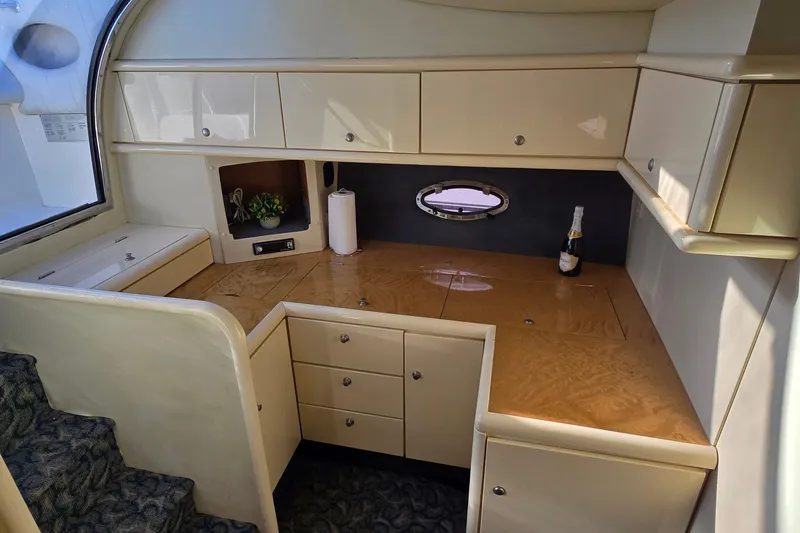 Slide: The Image of 1994 Sunseeker Mustique 42 yacht interior with elegant cabinetry and countertop. - 14