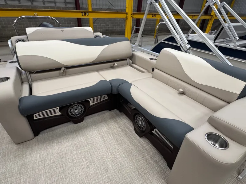 Slide: The Image of Interior of a modern boat with sleek, two-tone seating and built-in speakers. - 8