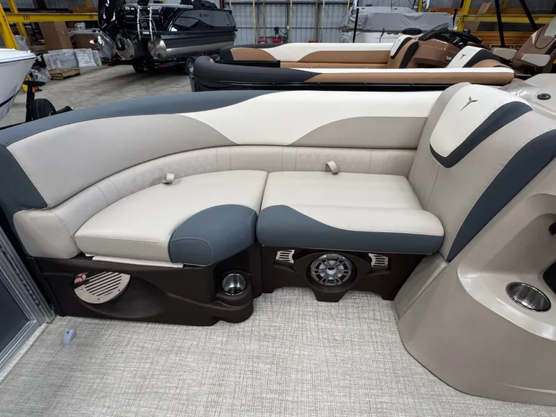 Slide: The Image of Interior of a 2025 Tahoe LTZ 2385 VRL with sleek, upholstered seating and speakers. - 4