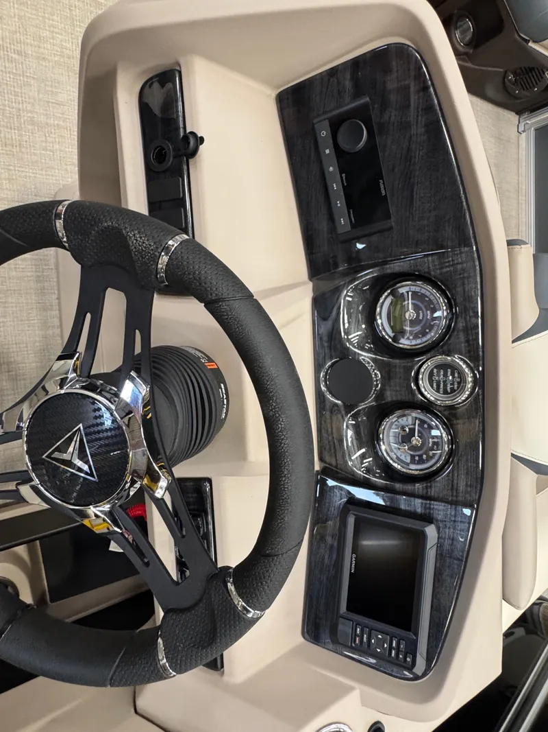 Slide: The Image of The dashboard of a 2025 Tahoe LTZ 2385 VRL with steering wheel and instruments. - 6