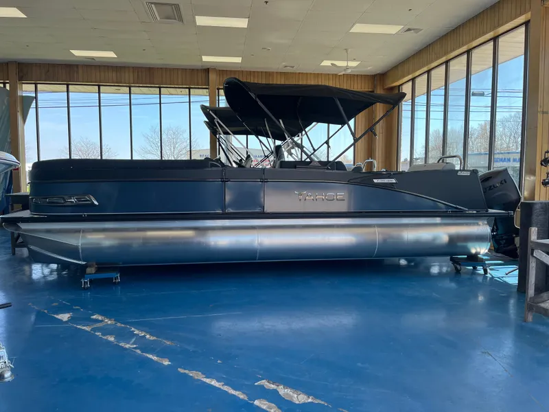 The Image of 2025 Tahoe Cascade 2585 VRL pontoon boat in a showroom. - 0
