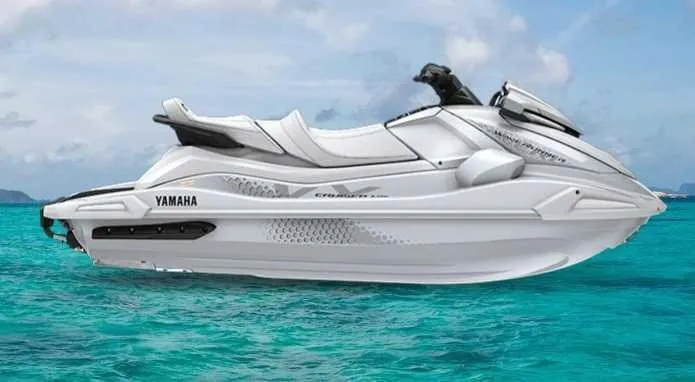 The Image of A white Yamaha WaveRunner VX Cruiser HO on turquoise water under a blue sky. - 1