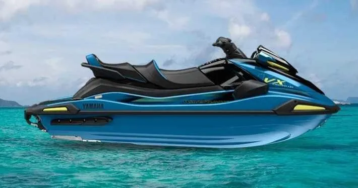 The Image of A blue Yamaha WaveRunner VX Limited HO from 2027 floats on clear turquoise water. - 1