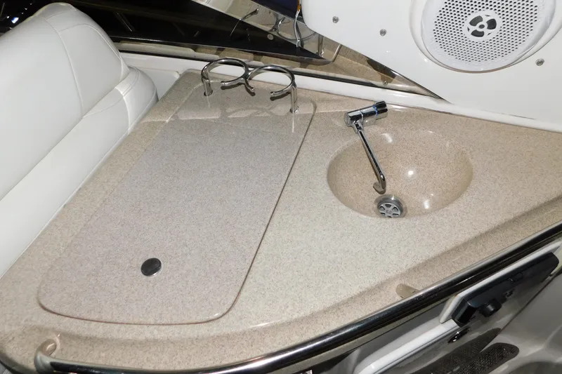 Slide: The Image of 2004 Regal Commodore 3860 boat interior with sink and countertop. - 35
