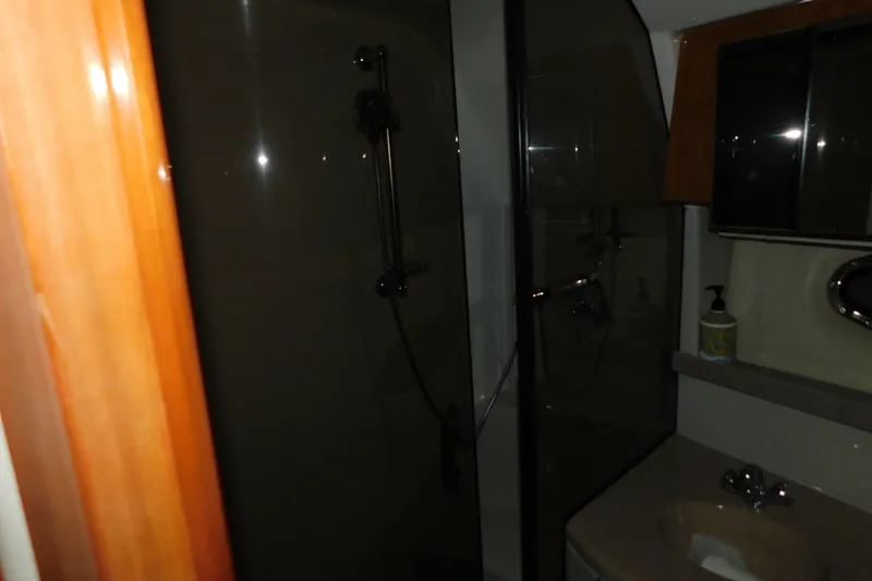 Slide: The Image of Bathroom interior of 2004 Regal Commodore 3860 yacht with shower and sink. - 69