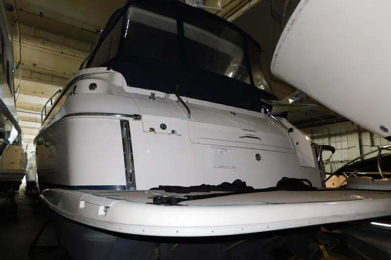 Slide: The Image of 2004 Regal Commodore 3860 yacht in indoor storage, rear view. - 5