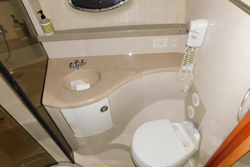 Slide: The Image of Bathroom in 2004 Regal Commodore 3860 yacht with sink, toilet, and shower. - 72