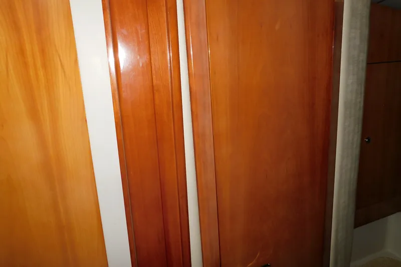 Slide: The Image of Wooden interior paneling of a 2004 Regal Commodore 3860 yacht. - 66