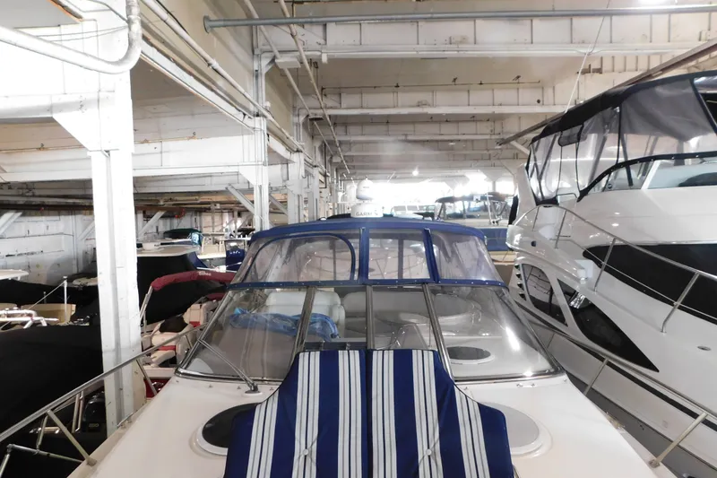 Slide: The Image of 2004 Regal Commodore 3860 yacht in indoor storage facility. - 102