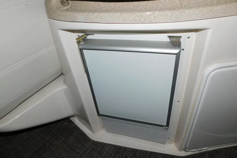 Slide: The Image of Compact refrigerator in 2004 Regal Commodore 3860 yacht interior. - 33
