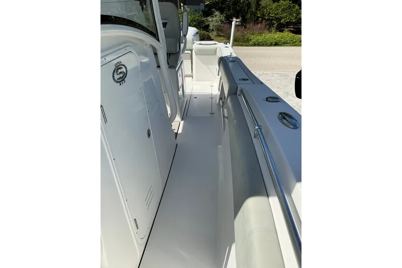 Slide: The Image of 2019 Sportsman Open 312 Center Console boat deck, featuring sleek design and spacious layout. - 39